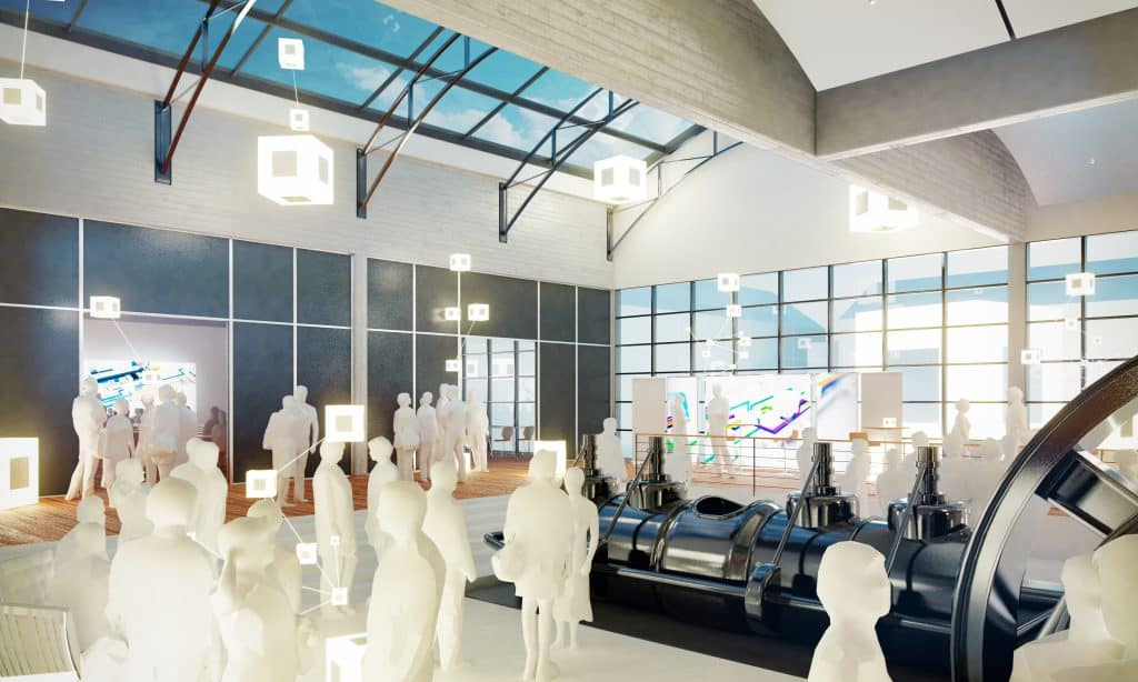 Innenansicht eines modernen Raumes mit mehreren Menschen und Maschinen in einem hellen, offenen Bereich.