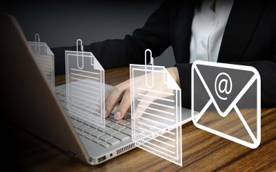 Business professional sending email with multiple document attachments using laptop computer, symbolizing modern workplace technology and online confor business email with digital attachments concept