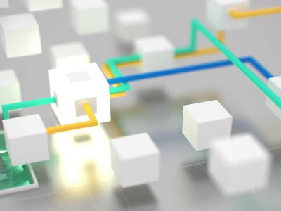 Grafik mit weißen Würfeln und bunten Leitungen, die durch einen Schaltkreis verbunden sind.