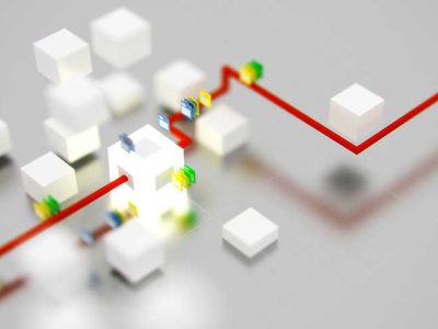 Abstrakte Anordnung von weißen Würfeln und roten Linien auf einer glatten Oberfläche.